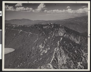 Echo Mountain Observatory and surrounding mountain seen from a distance, April, 1924