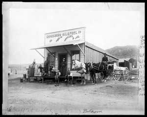 Members of the Morgan family in front of the Randsburg Oil and Fuel Company building, 1898
