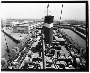 View of the deck of a large ship as seen from above in the Port of Los Angeles