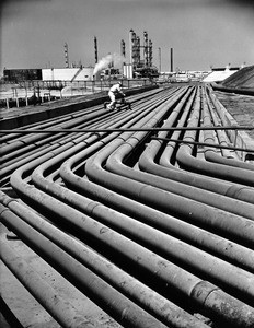 Pipes at an unidentified oil refinery, 1940-1950