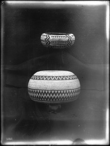 Two Indian baskets on display, ca.1900