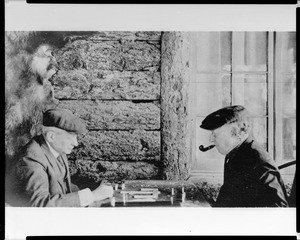 Two members of the Sunset Club playing dominoes, ca.1910