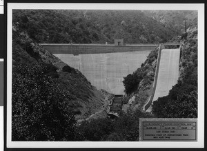 San Dimas Dam, showing a general view of the downstream face and spillway, May 23, 1935