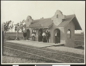 Group posing in front of Modjeska Park station on Santa Ana line, ca.1900-1910