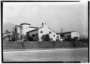 Exterior view of a large unidentified Mission-style house