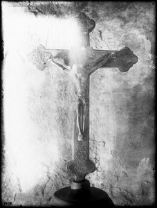 Front of a carved or engraved crucifix at Mission San Buenaventura, California, ca.1903