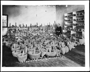 Charles H. Culp's collection of Indian mortars and pestles, the largest in the world, Pacific Grove, Monterey, ca.1900