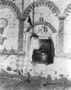 Ancient baptismal font at Mission Asistencia of San Antonio at Pala, ca.1900