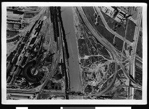 Aerial view of Los Angeles River showing the Santa Fe engine facility at Redondo Junction, 1938