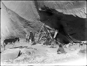 Navajo Indian family living in ancient cliff dwellings, Canyon de Chelly, Arizona, 1903