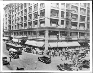 The busy street corner below Bullock's Department Store on Broadway and Seventh Street in Los Angeles, ca.1926