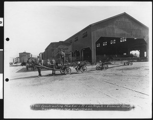 Horse and wagon transporting a new underframe for railroad car constructed at Los Angeles General Shops, ca.1900