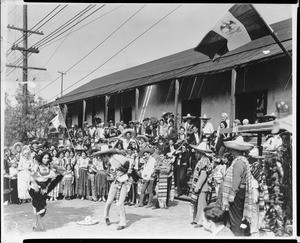 Mexican Hat Dance in front of the Casa de Avila on Olvera Street, Los Angeles, ca.1920