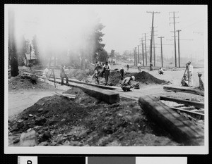 Construction of a railroad crossing, ca.1930