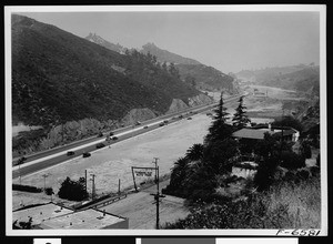 View of Cahuenga Pass with the Pilgrimage Play parking lot in the foreground, 1930-1939