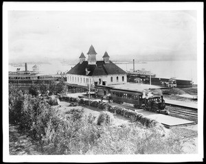 View of the Hotel Del Coronado's original boathouse, ferry landing and railroad station, ca.1888