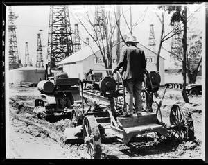 Man operating a very large tractor