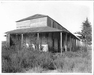 Exterior view of a dilapidated adobe ranch house of Don Bernardo Yorba , Santa Ana Valley, ca.1892