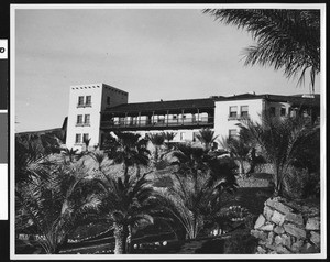 Exterior view of the gardens at Furnace Creek Inn in Death Valley, ca.1931-1935