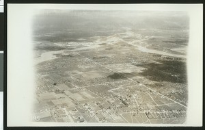 Aerial view of flooding near the San Gabriel River and the fork of the Rio Hondo River, ca.1930