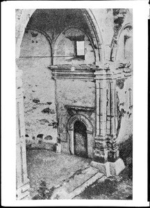 Birdseye view of the pillars and the door to the Sanctuary at Mission San Juan Capistrano