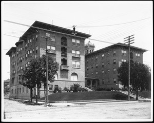 Exterior view of the Hotel Leighton from the intersection of Sixth Street and Alvarado Street in Los Angeles