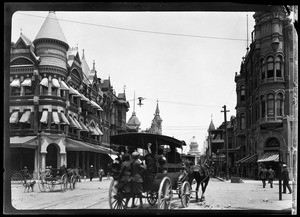 Horse-drawn carriages on a downtown street in Fresno, ca.1905