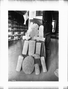 Stone Gods on display from prehistoric pueblo ruins near Santa Fe, New Mexico, ca.1895