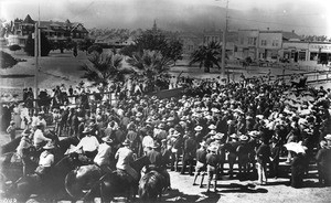 Crowd of veterans "Teddy's Terrors" standing in a Santa Ana park, ca.1904