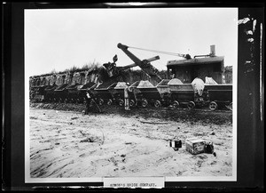 Rubble being loaded into railroad cars via steam shovel for Simon's Brick Company