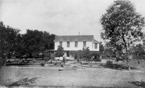 A two-story house located on a ranch in Van Nuys in the southeasterly portion of the San Fernando Valley, California, ca.1882