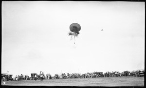 Parachutist dropping from a balloon at the Dominguez Hills Air Meet, 1912