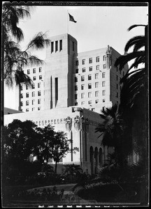 View of the Elk's Club building in Los Angeles from the bushes of Macarthur Park, January 1930