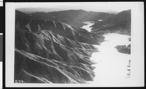 Aerial view of the reservoir above the San Gabriel Dam Number One, ca.1920