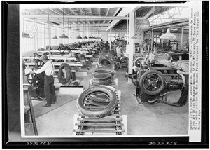 Factory workers making tires in a Samson Tire and Rubber Corporation plant, Compton