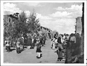 Procession of dancers and singers at Fiesta de San Esteban (Saint Stephen), Acoma Pueblo, New Mexico, 1886