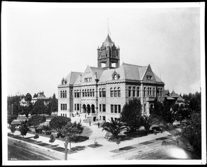 Birdseye view of the old Orange County Courthouse in Santa Ana, showing pedestrians at steps, ca.1900