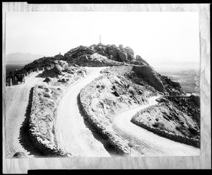 Panoramic view of Mount Rubidoux summit showing the cross at the peak of the summit, ca.1919-1924