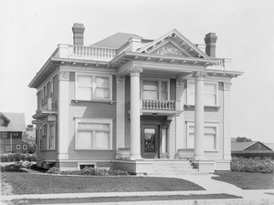 Exterior view of an unidentified Colonial Revival-style home in Los Angeles