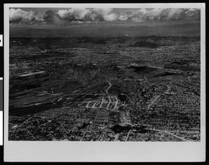 Aerial view of Baldwin Hills showing oil wells at center, ca.1940-1949