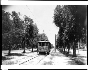 View of an electric railroad car on tracks near Euclid Avenue in Upland, ca.1905