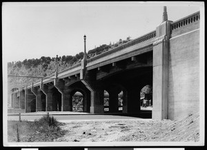 Concrete viaduct over a street