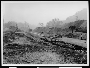 Slauson Avenue storm drain construction, showing a crane