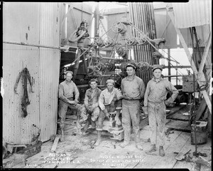 Workers standing near the Shell Oil Company Williams #1 Well, at the time the deepest in the world, March 6, 1931