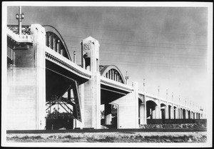 Sixth Street Viaduct spanning the Los Angeles River, showing the large bridge, 1900