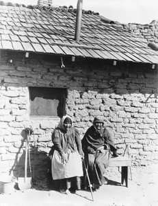 Portrait of Mission San Fernando Indian women in front of a brick building, ca.1890