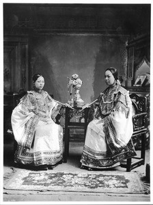 Chinese young women in fine clothing, ca.1900