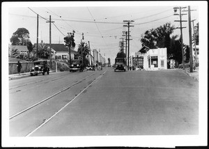 View of Temple Street looking west at Boylston Street prior to pavement widening and grade correction, ca.1930-1960