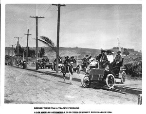 First automobile parade in Los Angeles, sponsored by the Los Angeles Automobile Club, looking east on Sunset Boulevard, 1904