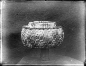 Indian basket on display, ca.1900